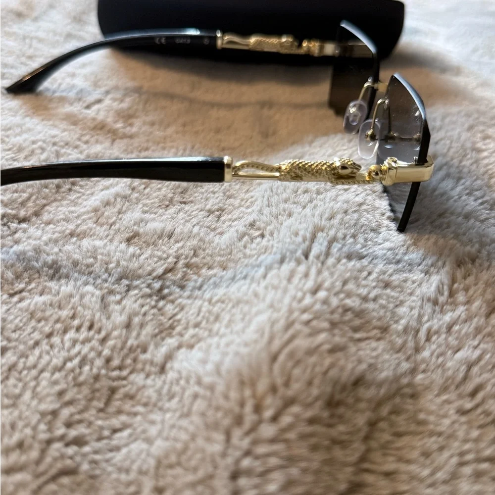 Fashion Nova Black and Gold Rimless Sunglasses